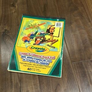 Crayons crayon and colored pencil pad.